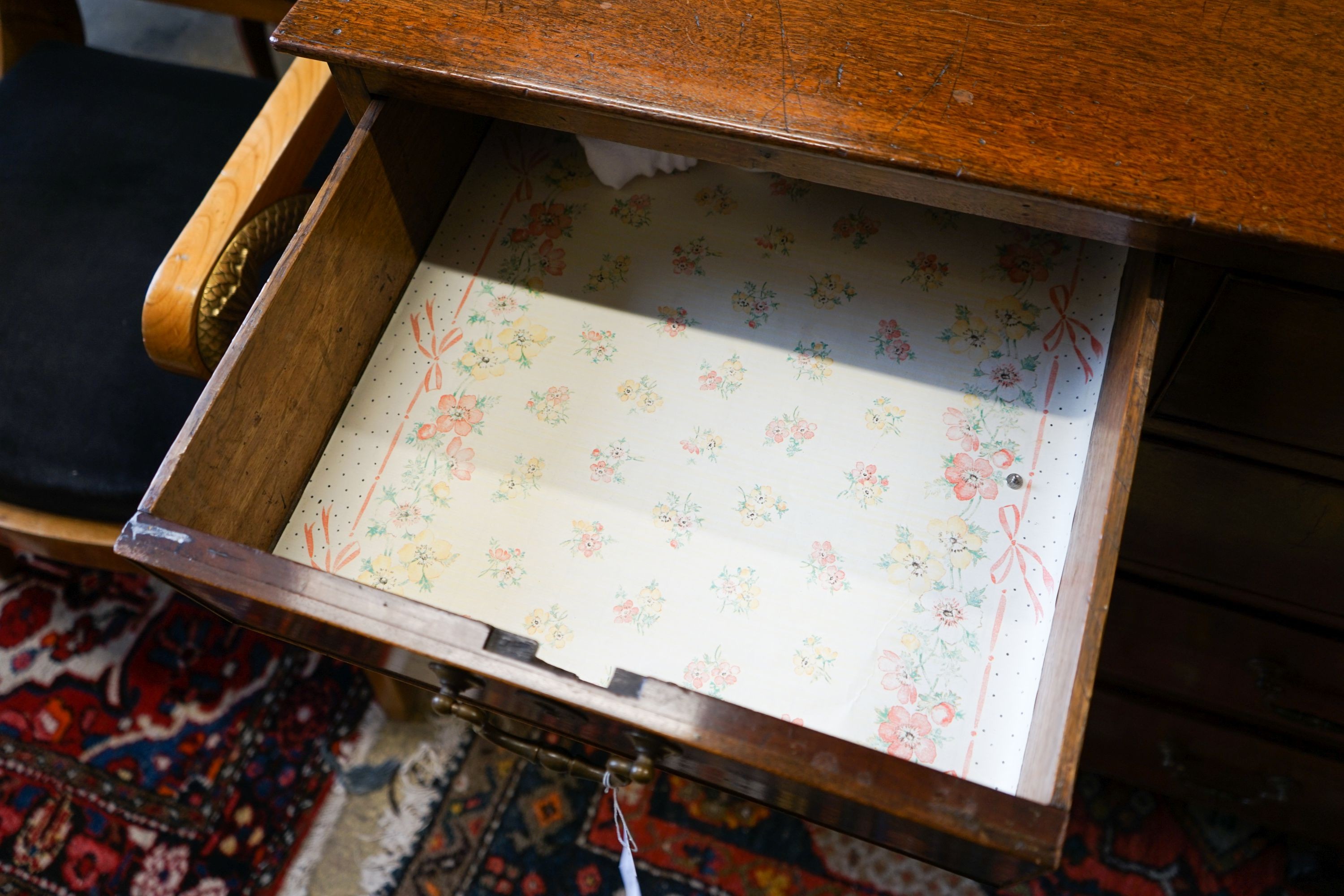 A George III mahogany chest of three long and two short drawers, on carved ogee bracket feet, width 95cm, depth 52cm, height 89cm